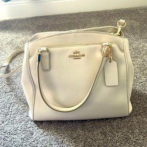 Coach crossbody bag in cream color